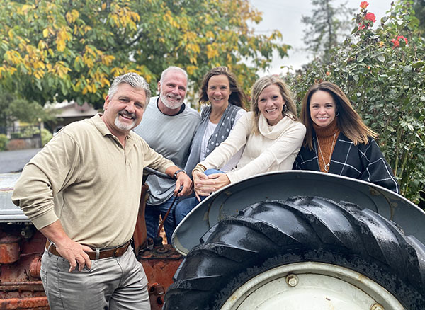 OHG Team on a tractor in fall